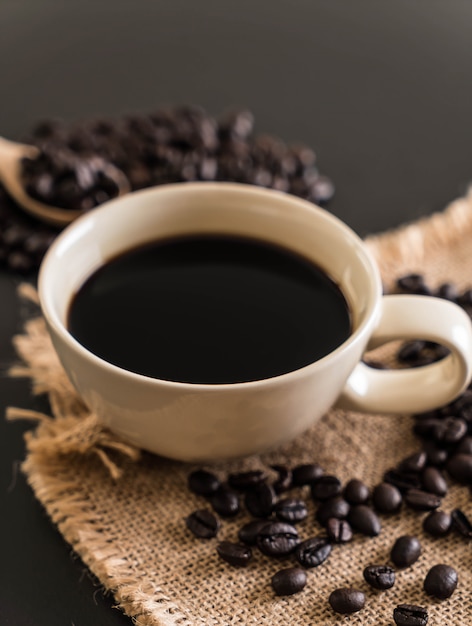 Coffee cup and beans