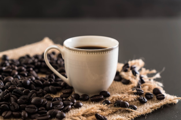 Coffee cup and beans