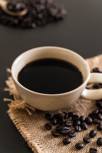 Coffee cup and beans