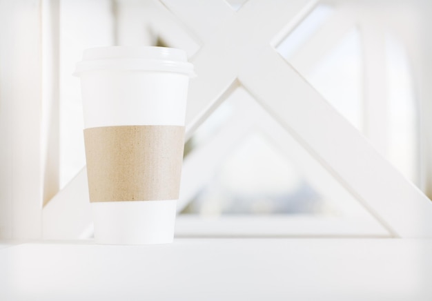 Coffee cup on blurry background