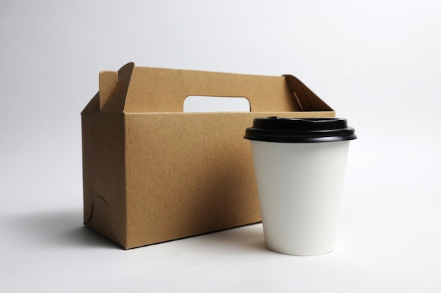 Photo coffee cup and box delivery free photo