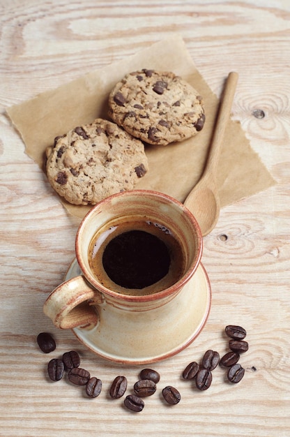 Coffee cup and chocolate cookies