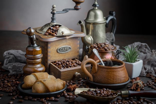 Coffee in a cup on coffee beans