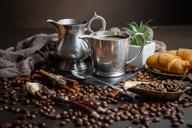 Coffee in a cup on coffee beans