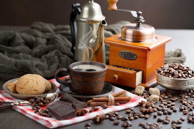 Coffee in a cup on coffee beans