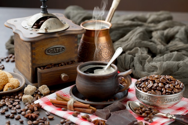 Coffee in a cup on coffee beans