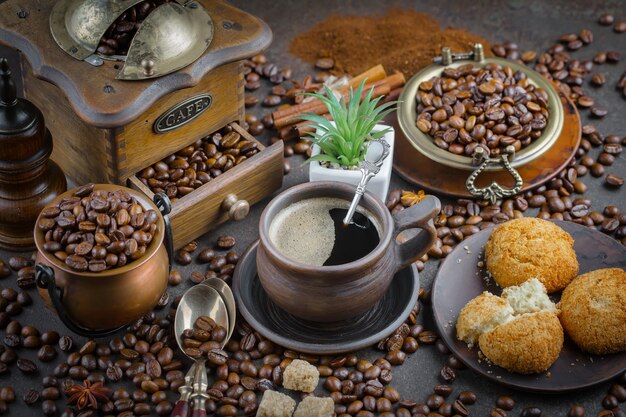 Coffee in a cup on coffee beans