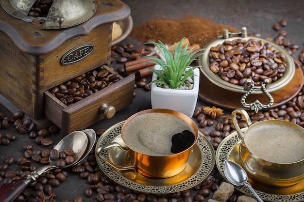 Coffee in a cup on coffee beans