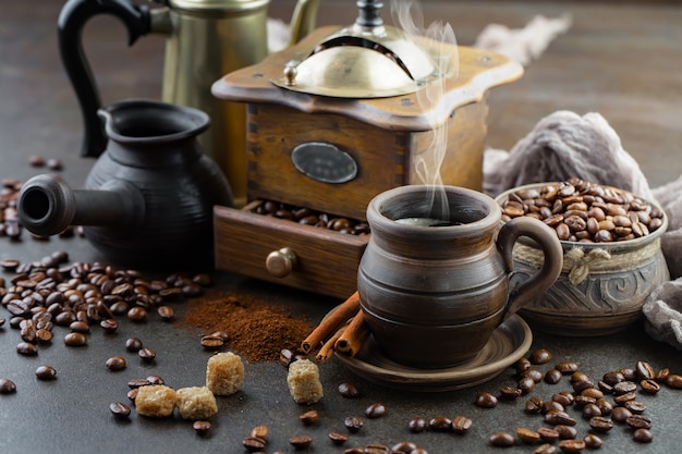 Coffee in a cup on coffee beans