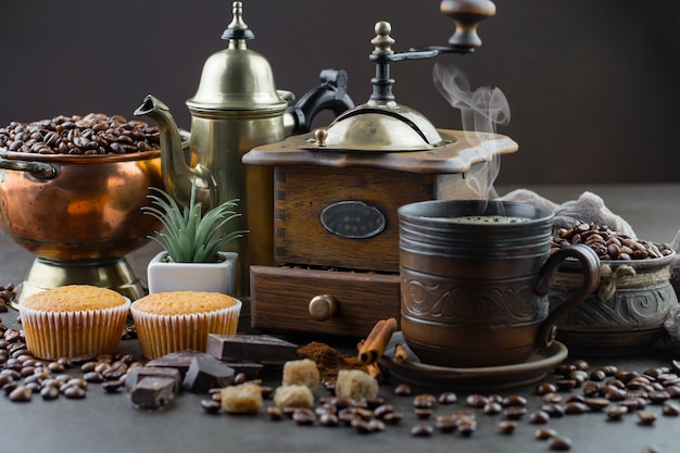 Coffee in a cup on coffee beans