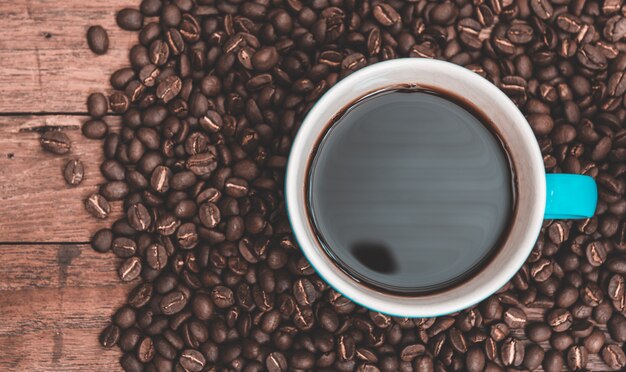 Coffee cup and coffee beans