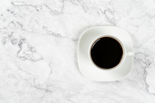 coffee cup on marble table background,