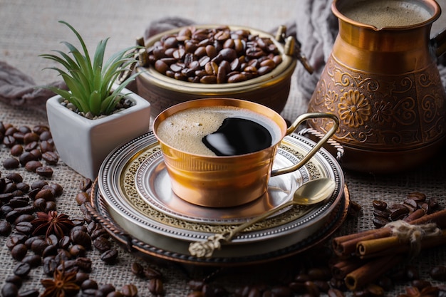 Coffee in a cup on an old background