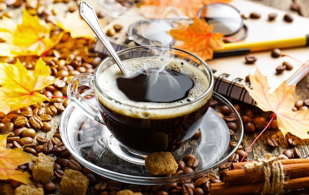 Coffee in a cup on an old background.