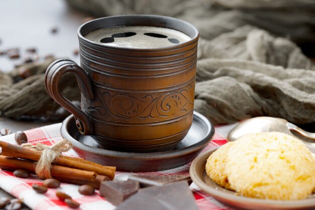 Coffee in a cup on an old background