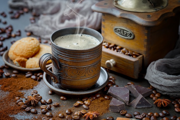 Coffee in a cup on an old background