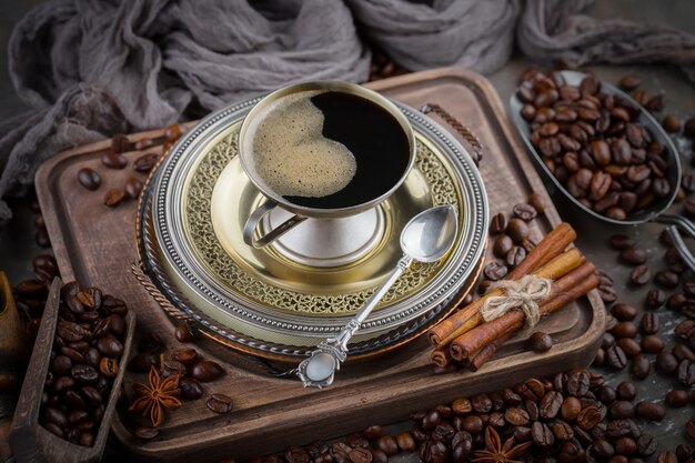 Coffee in a cup on an old background