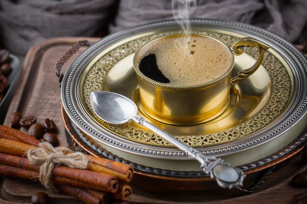 Coffee in a cup on an old background