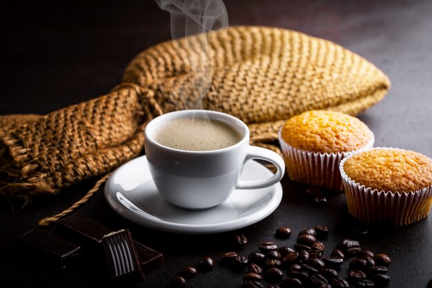 Coffee in a cup on an old surface