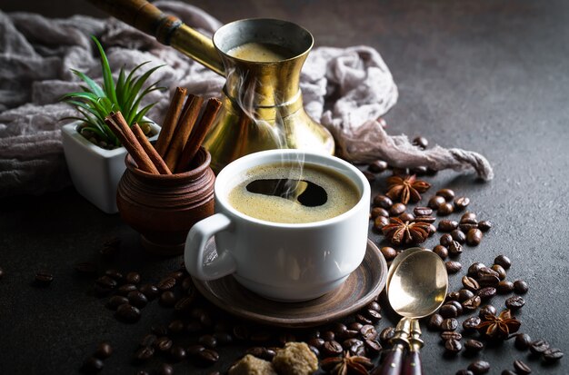 Coffee in a cup, on an old table.