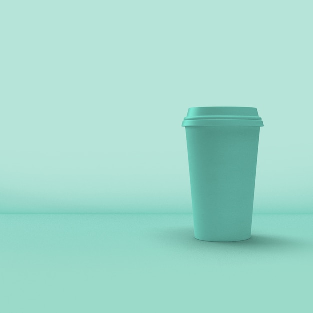 青い背景の上のコーヒーカップの包装