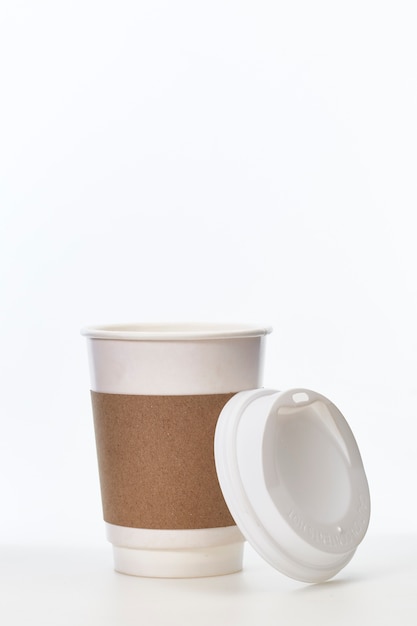 Coffee cup of paper on white