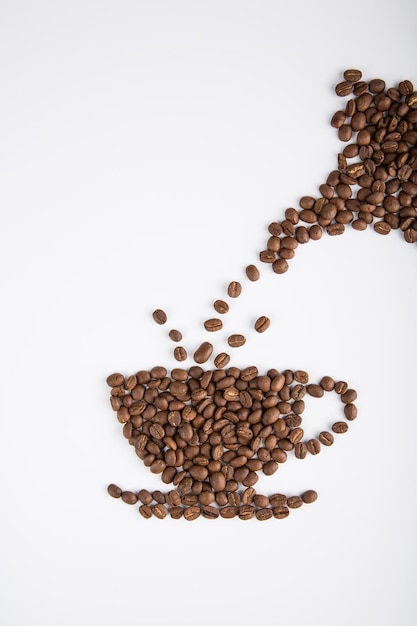 a coffee cup pattern formed by real coffee beans