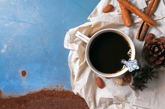 Coffee cup on rustic background