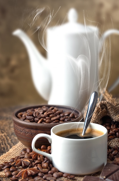 Coffee in a cup and saucer on an old space.