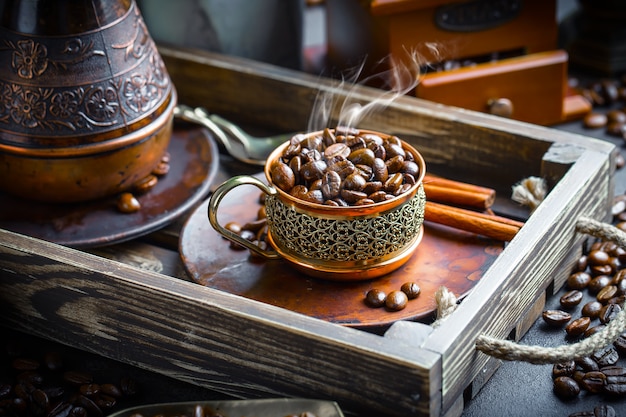 Coffee in a cup and saucer on an old.