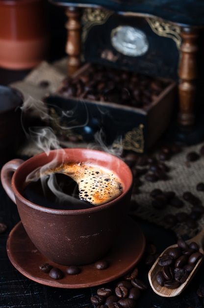 Coffee cup and saucer on a wooden table. 