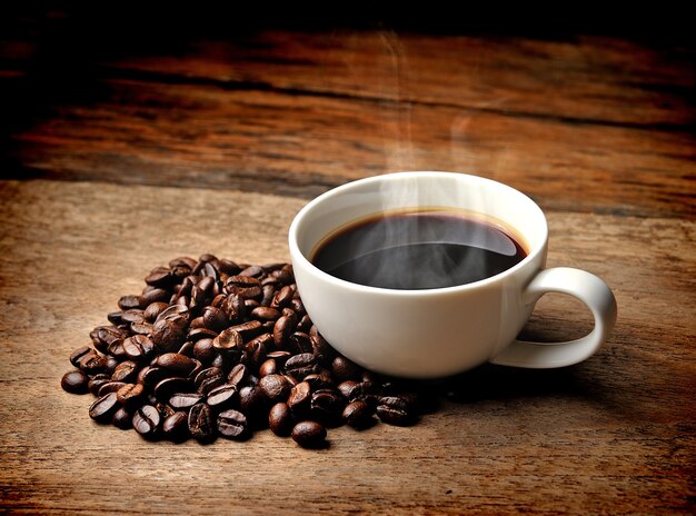 Coffee cup and saucer on a wooden