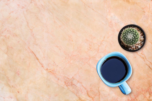 coffee cup and stationary on wood table