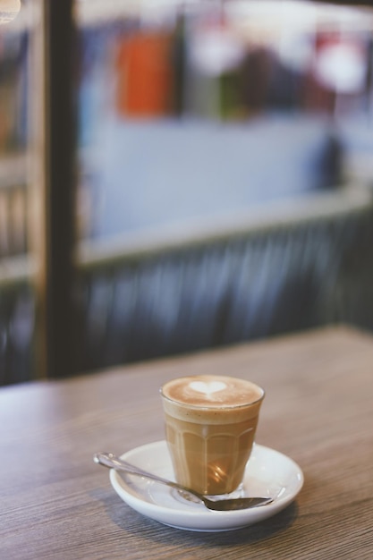 Coffee cup on table at cafe