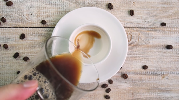 Coffee in a cup on the table. selective focus. Nature