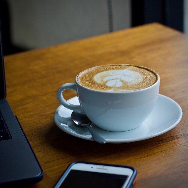 Coffee cup on table