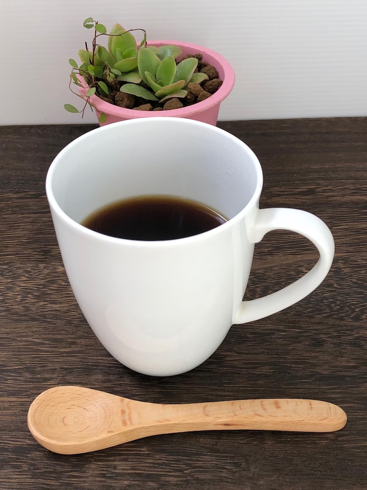 Photo テーブルの上のコーヒーカップ