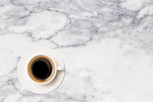 Coffee cup, top view of coffee cup on marble table