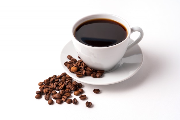 Coffee cup with beans isolated on white background.