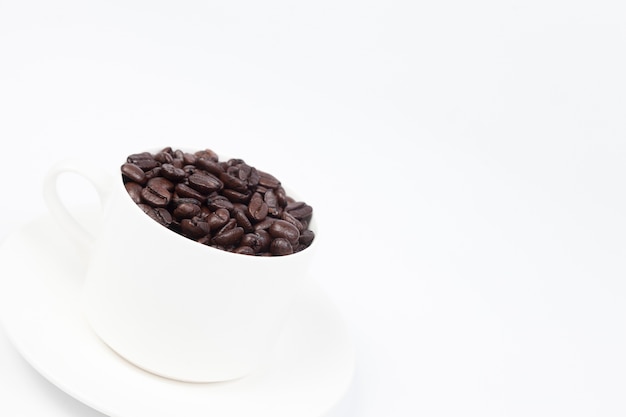 Coffee cup with coffee beans