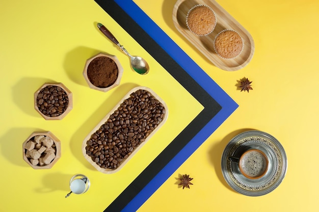 Coffee in a cup with dessert on a bright colored background