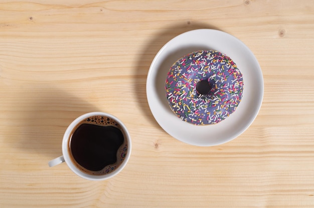 Coffee cup with donut