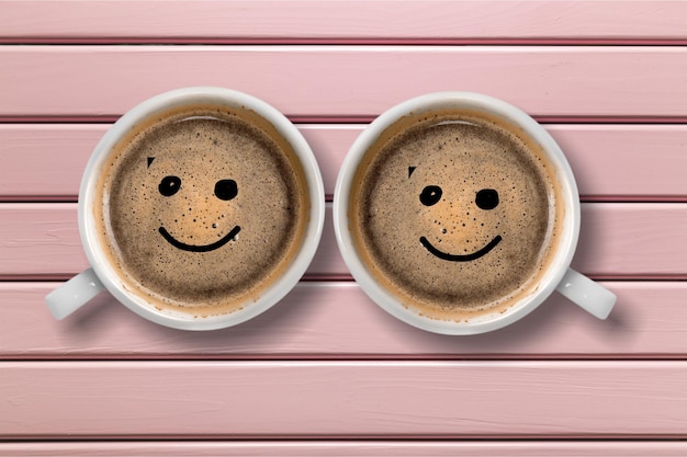 Coffee cup with happy faces