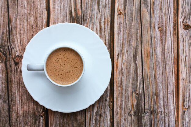 Coffee cup on wooden table