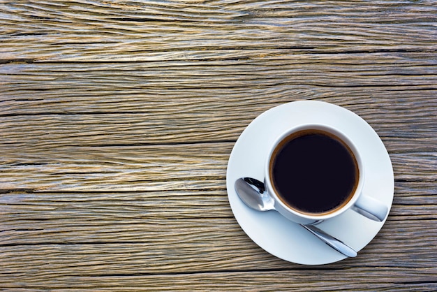 Coffee cup on wooden