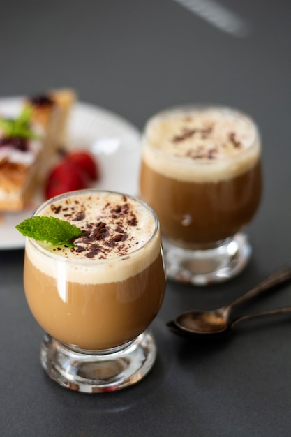 Photo coffee drink with ice cream, espresso. affogato, summer refreshing drink in glass.