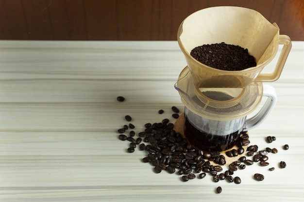  coffee drip cup on white table