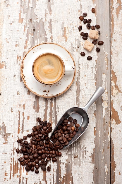 Coffee espresso on an old wooden background