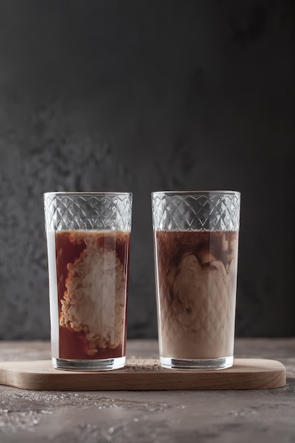 Coffee in a glass. Cappuccino with cream. Beautiful blurred coffee