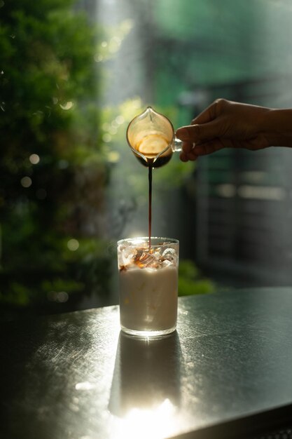 Photo coffee in a glass on a table in a cafe